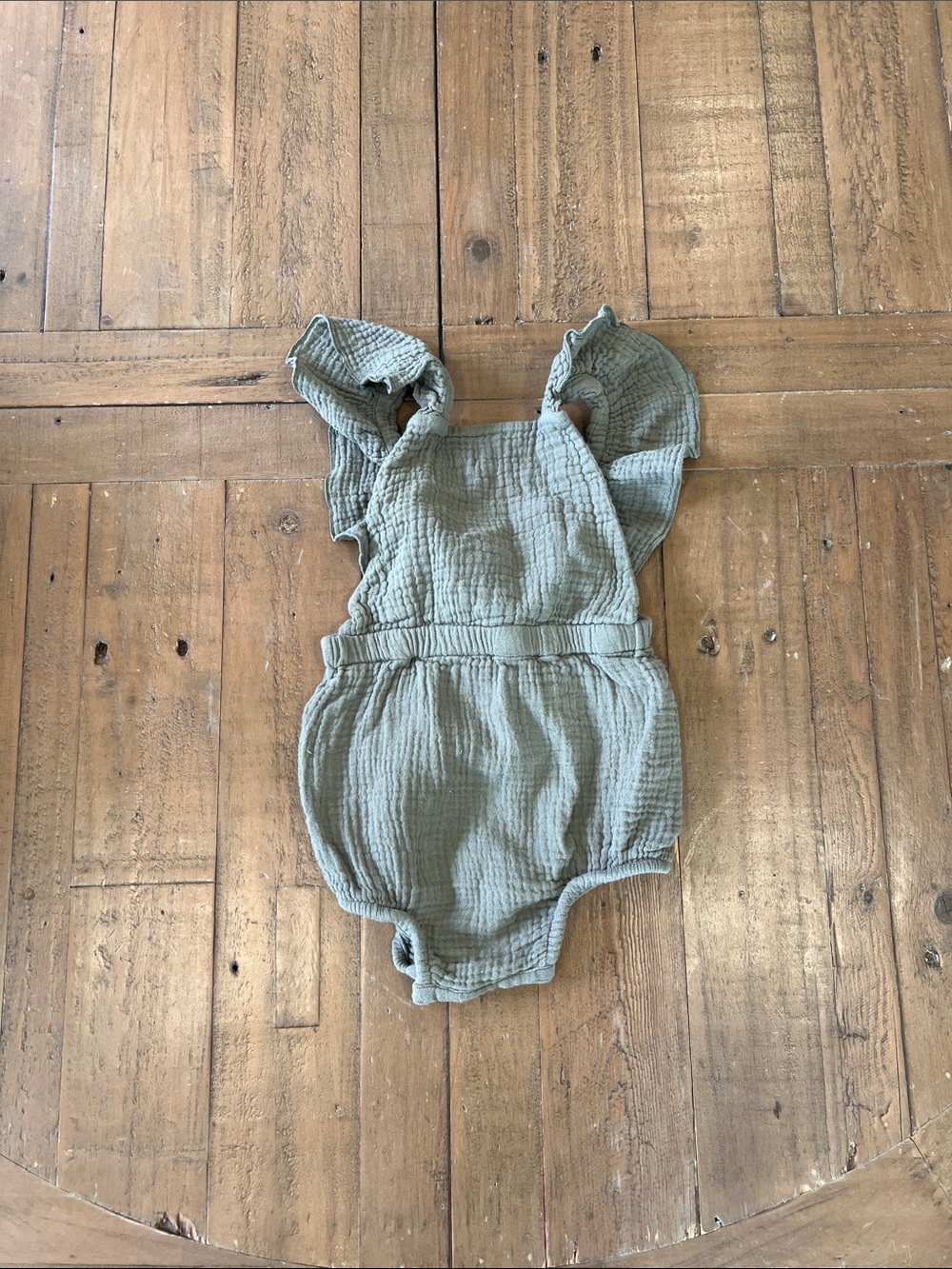 The simple folk green gauzy cotton ruffle strap bubble romper 12-18 months